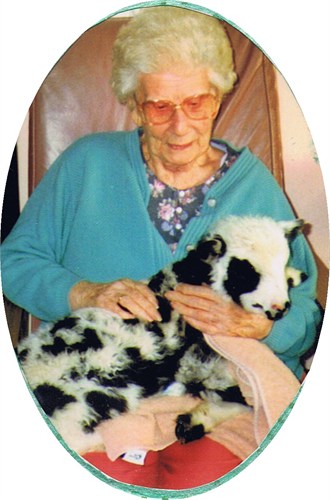 My Grandma, Madeline Carter visited by a lamb in the nursing home.