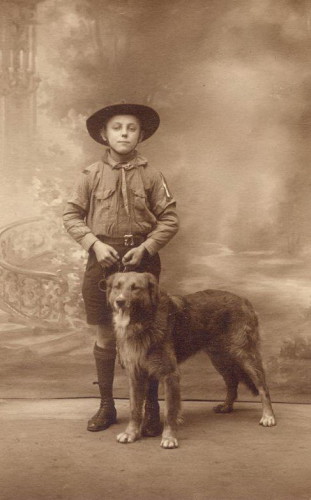 Portrait of my husband's Great-Grandfather and his dog in France 