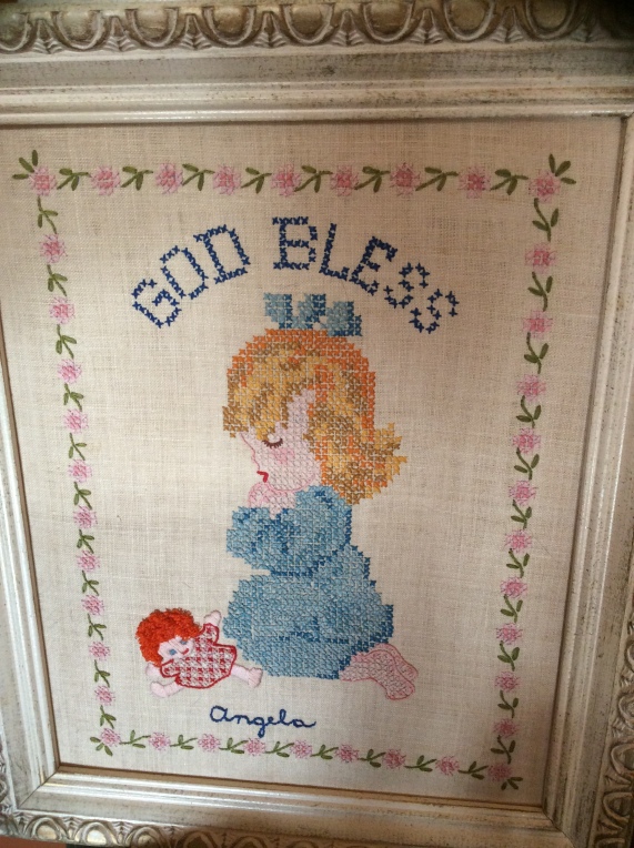 A sampler made by my mother when I was born.